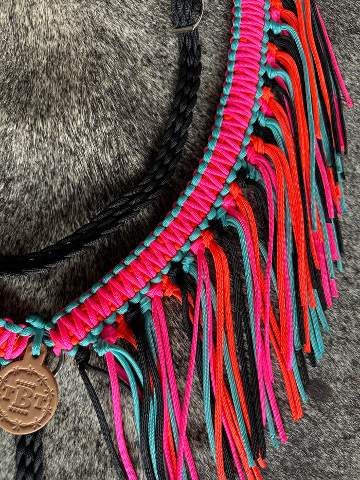 fringe breast collar hot pink, black,turquoise, and orange with a wither strap