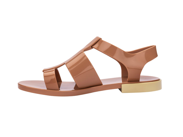 Melissa Blend Flat Strappy Brown Sandal styled for casual summer looks, offering comfort and sophistication in brown