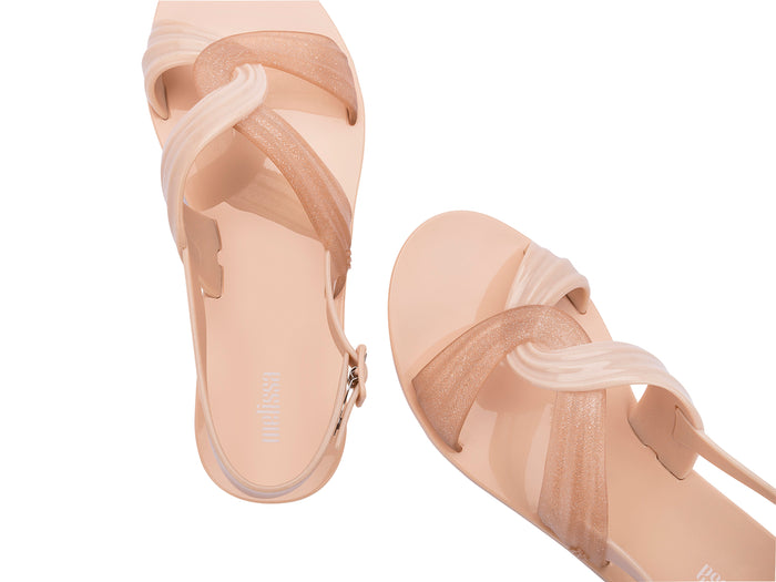 Melissa Essential Mix Knotted Beige Sandal for Women – Stylish flat sandals with a unique knotted strap design and a secure back-zip closure, perfect for comfort and everyday fashion.