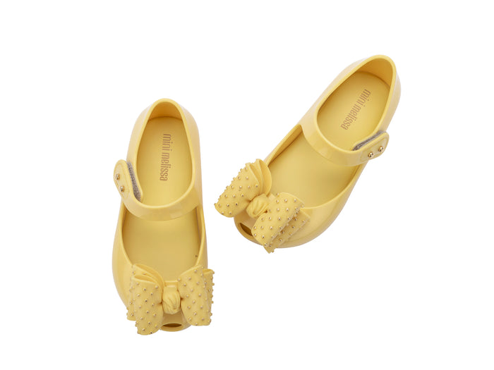 Mini Melissa Ultragirl Sweet VII Oversize Bow Yellow Baby Sandal – Adorable yellow baby sandals with a large bow design, comfortable fit, and charming style for little girls.