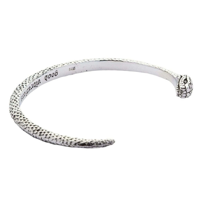 Isolated shot of the oxidized silver snake bracelet on white background showing full shape