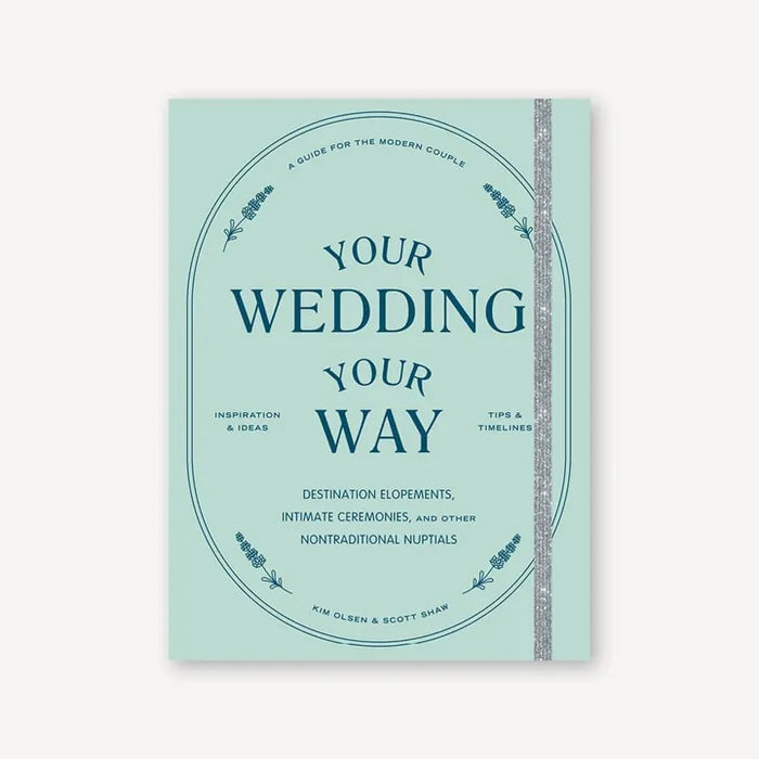 A book cover of 'Your Wedding, Your Way' featuring a title and author name, with a description of the book being a guide for modern weddings. The cover is predominantly teal with white text and decorative elements.