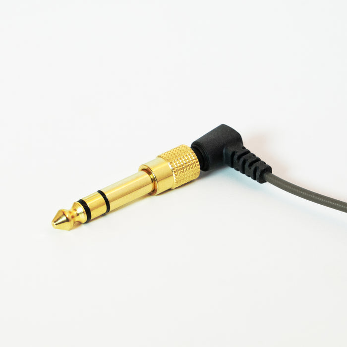 Gold 1/4" Adapter and a 3.5mm audio cable