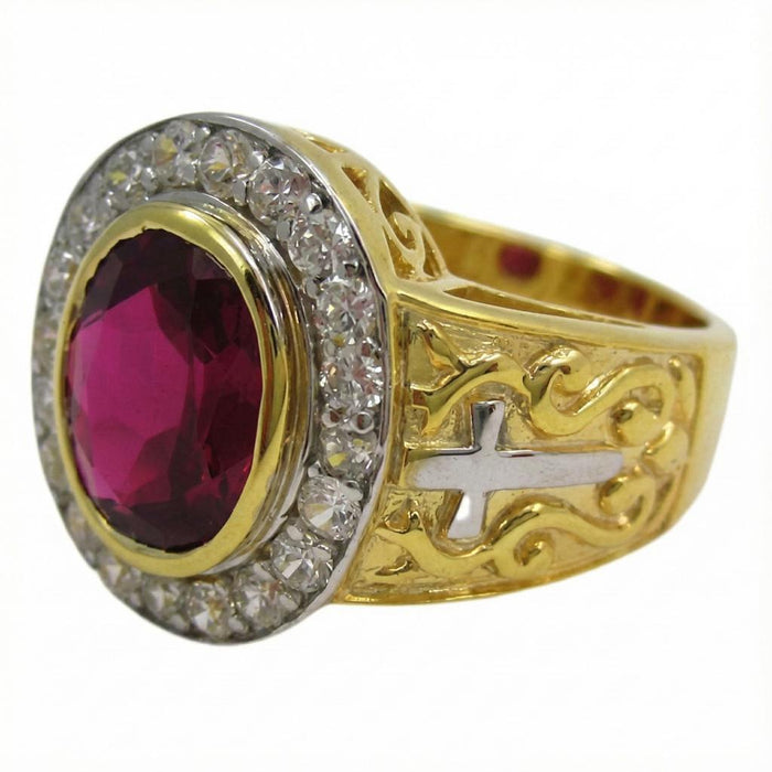 Handcrafted gold bishop ring highlighting intricate filigree and cross design