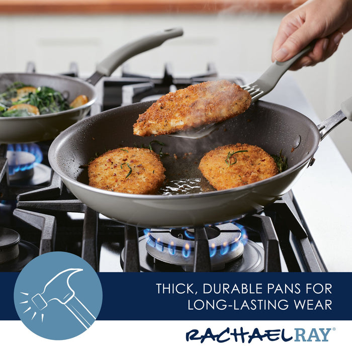 Cooking chicken cutlets in the 2-Piece Cook + Create Nonstick Frying Pan Set on a stove with blue flames.