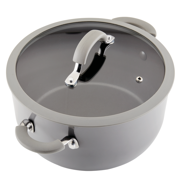 5-Quart Cook + Create Nonstick Dutch Oven with Lid, featuring a gray finish, glass lid, and two side handles, ideal for stove-to-oven recipes.