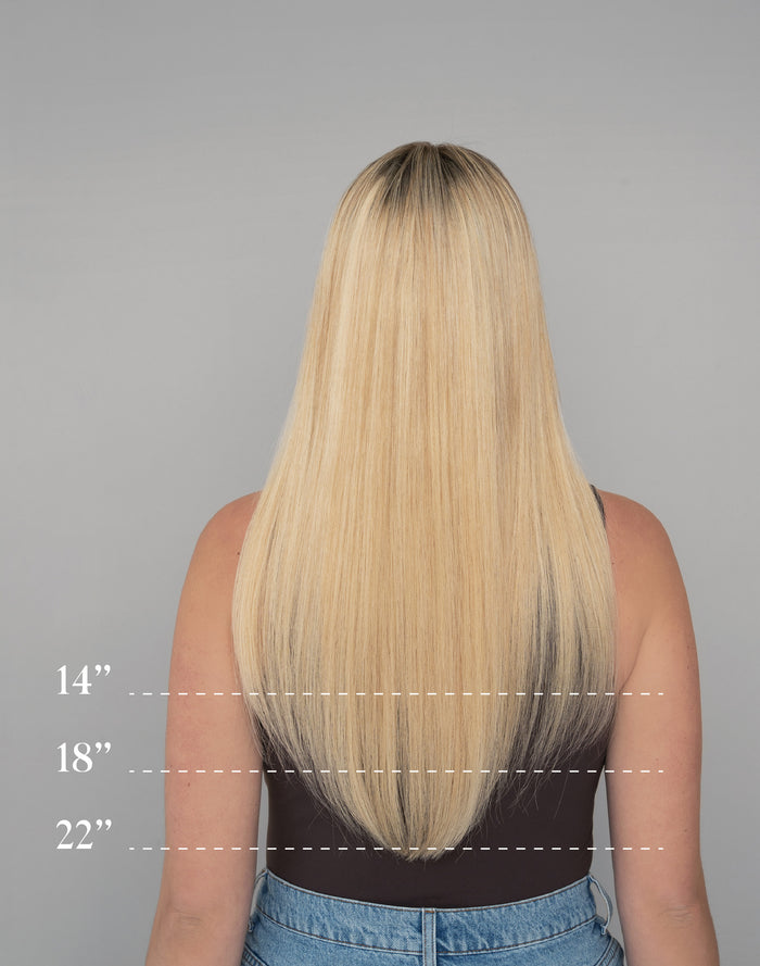 chart showing different lengths of straight hair on model. 14" hair length falls below armpits, 18" mid-back, 22" hips