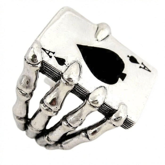 Three-quarter view of Ace of Spades Death Card ring displaying dimensional skeleton hand craftsmanship