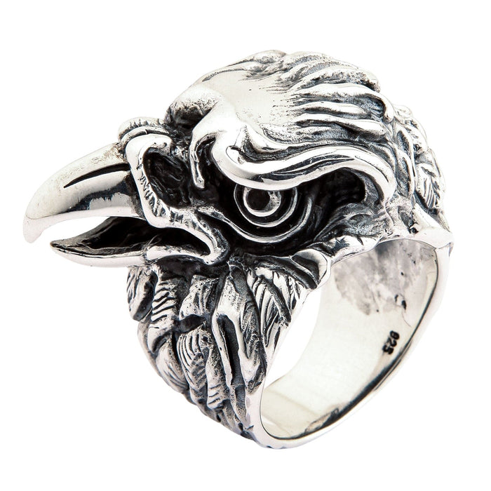 Close up of polished beak and eye on eagle head biker ring