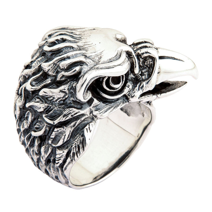 Detailed feather texture on handcrafted silver eagle ring side view