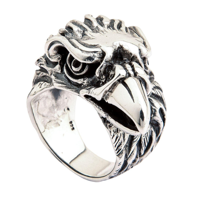 Side profile of sterling silver eagle ring with intricate feather carving