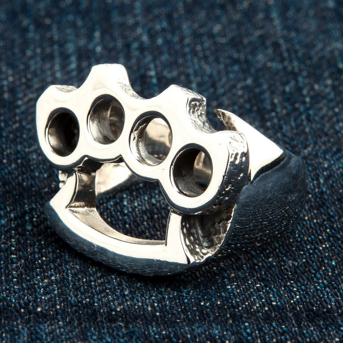Side profile of heavy sterling silver knuckle duster ring showing depth and craftsmanship
