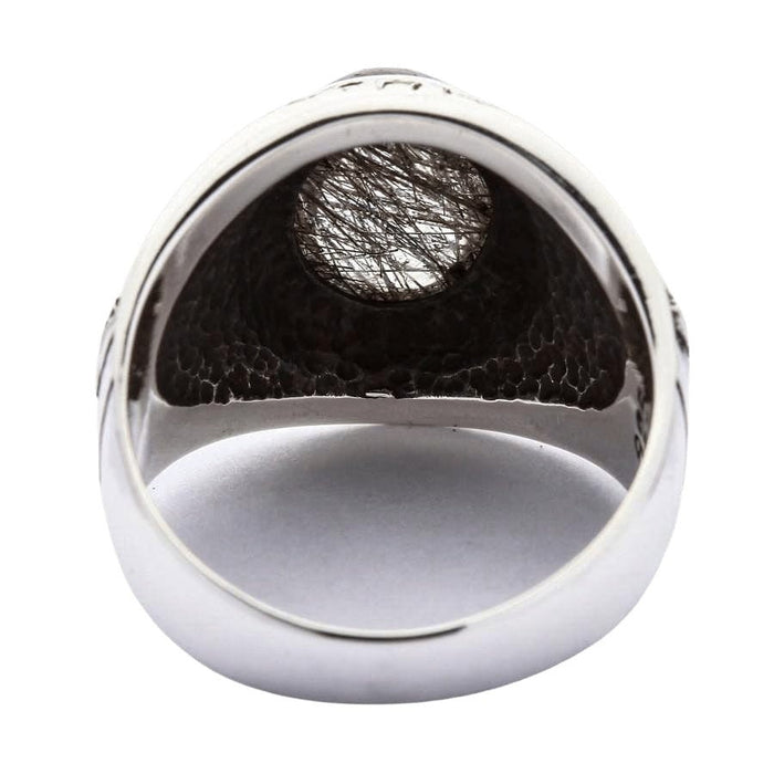 Back view of handcrafted black rutilated quartz ring showing stone setting and silver craftsmanship
