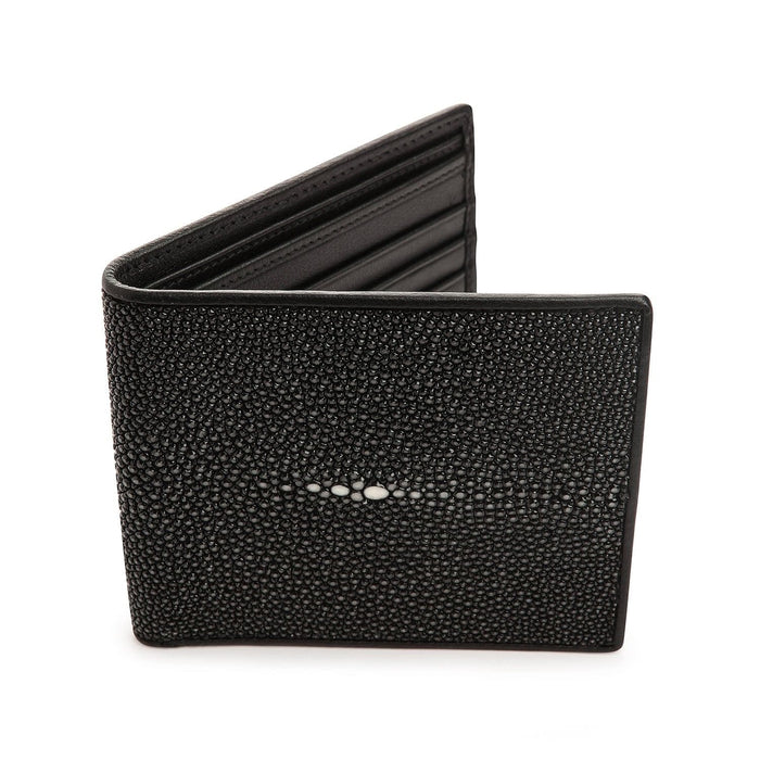 A polished black stingray leather wallet with a smooth, glossy finish and a distinctive white pearl mark.