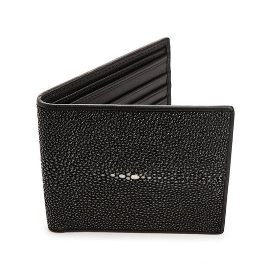 A polished black stingray leather wallet with a smooth, glossy finish and a distinctive white pearl mark.