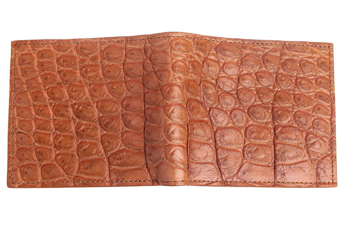The full exterior of the brown crocodile wallet laid flat, showing the unique scale pattern.