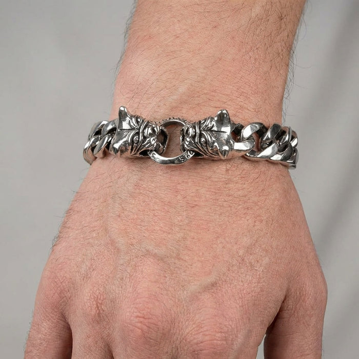 Men's bulldog head sterling silver bracelet worn on wrist showing fit and scale