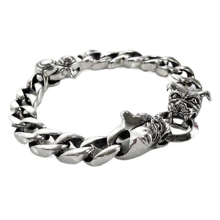 Detailed view of handcrafted bulldog heads on 925 sterling silver Cuban chain bracelet