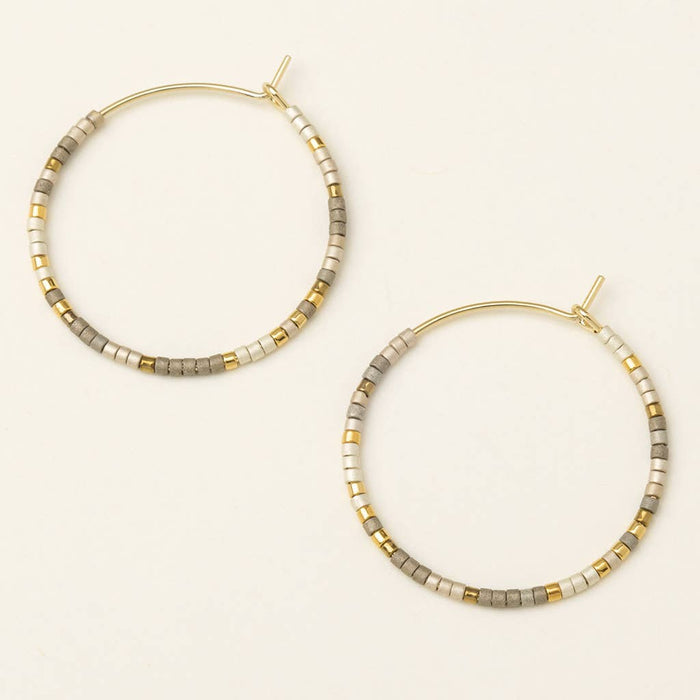gold hoop earrings with multicolored beads