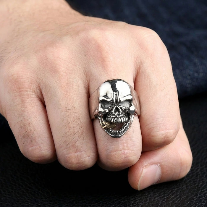 A classic smoking skull biker ring, meticulously handcrafted from solid sterling silver with a contrasting gold accent.
