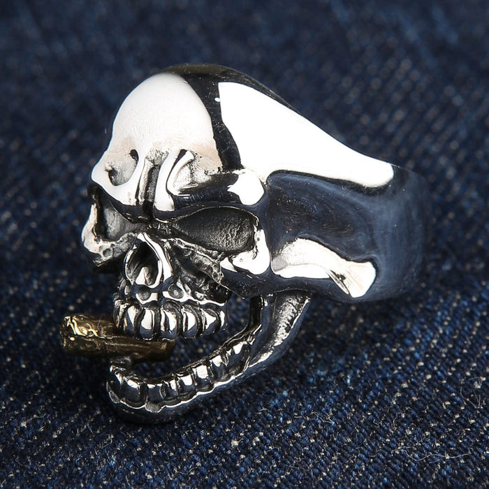 A classic rockabilly-style smoking skull ring, a bold statement piece embodying a devil-may-care attitude.