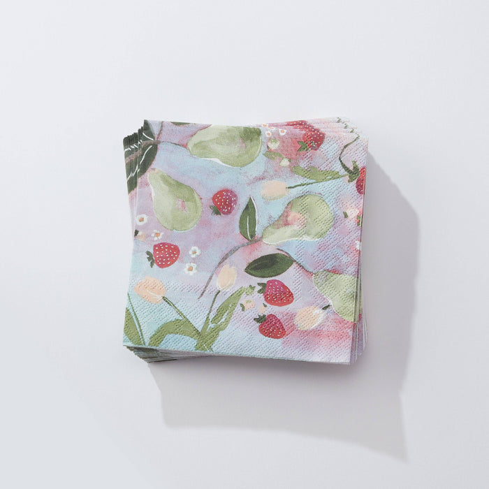 Fruit patterned cocktail napkins against white background