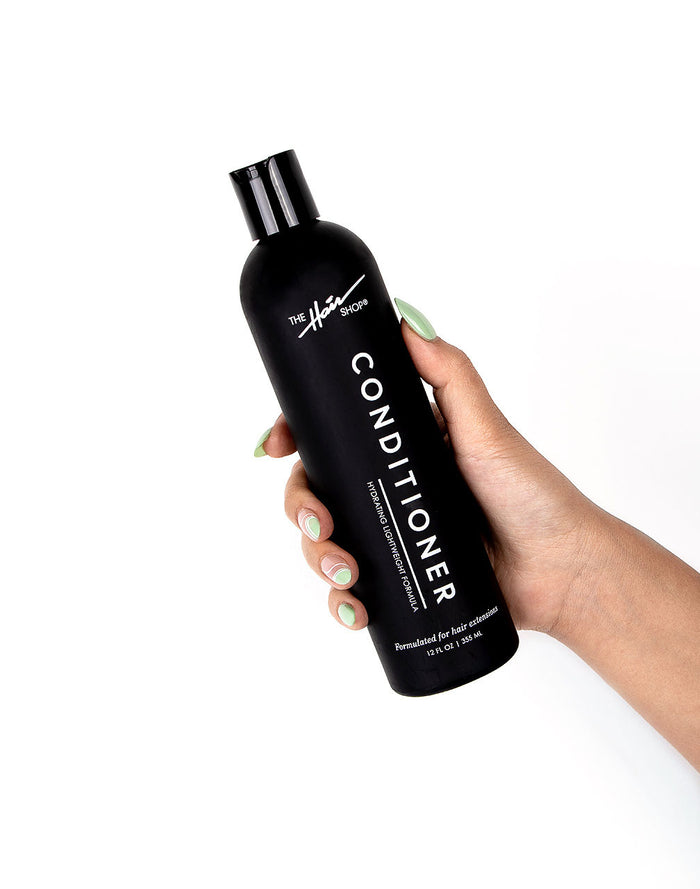 hand holding Conditioner