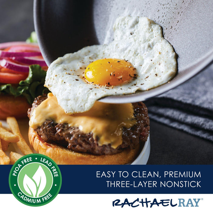 The Cook + Create Hard Anodized Nonstick Frying Pan, with its triple-layer nonstick surface, showcases a perfectly fried egg hovering above a delicious cheeseburger and fries.