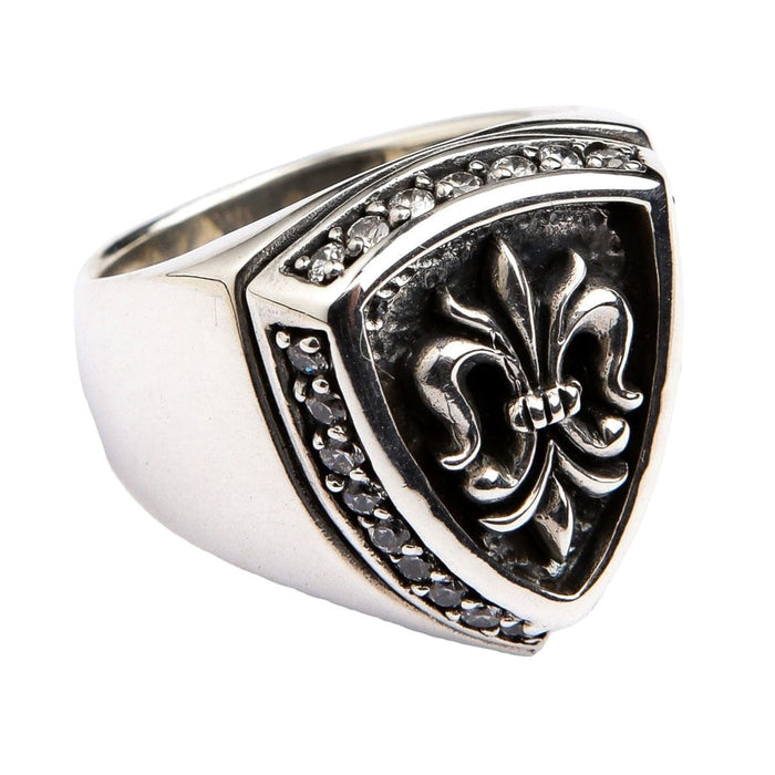 Angled shot of the luxury biker ring highlighting the polished silver finish and stone detailing.