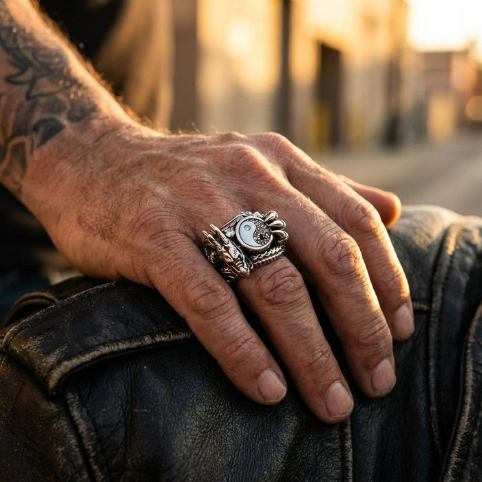 Man wearing dragon yin yang sterling silver ring with leather jacket