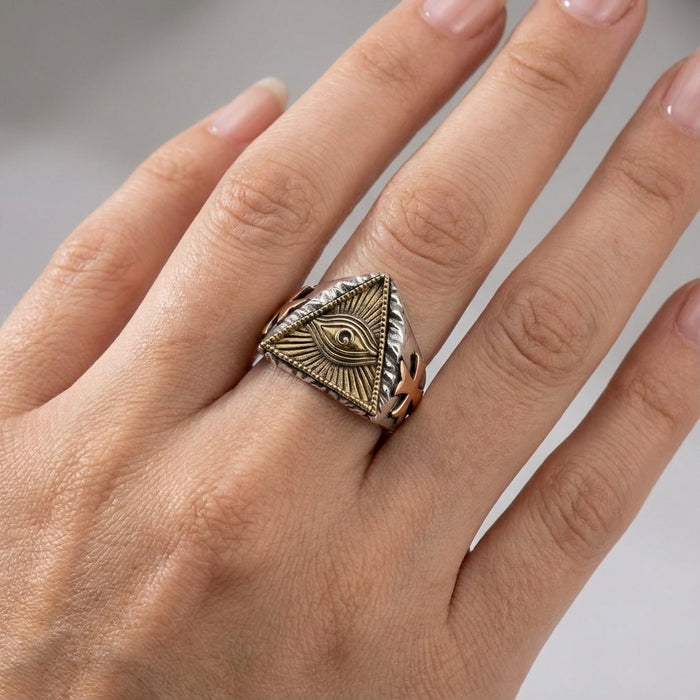 Eye of Providence ring worn on model finger for scale