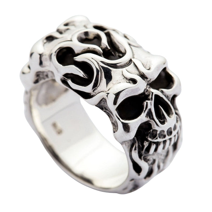 A sterling silver gothic skull ring featuring a detailed skull that is completely engulfed in stylized, flowing flames.