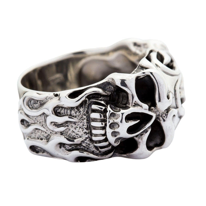 A heavy 23-gram biker skull ring with a powerful and intricate tribal flame motif forged in solid silver.