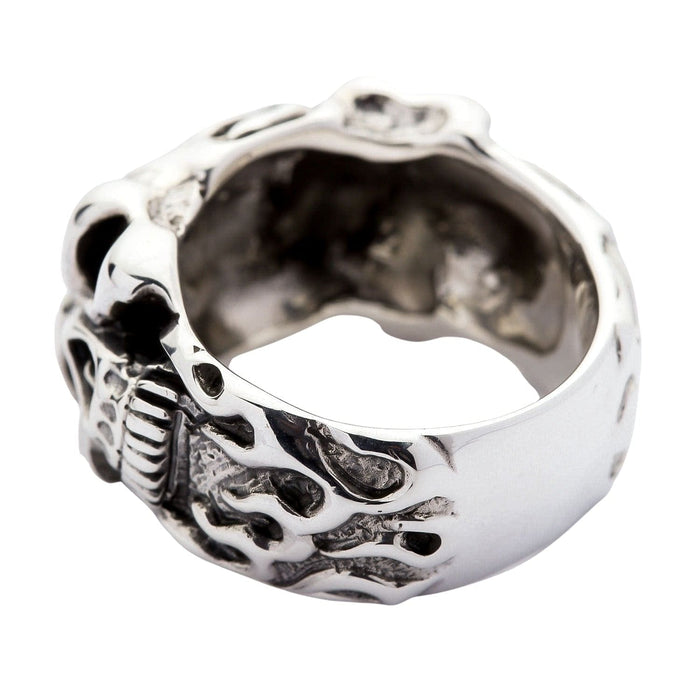 Rear three-quarter with the flame carving running round the band and the skull's jaw just catching the edge.