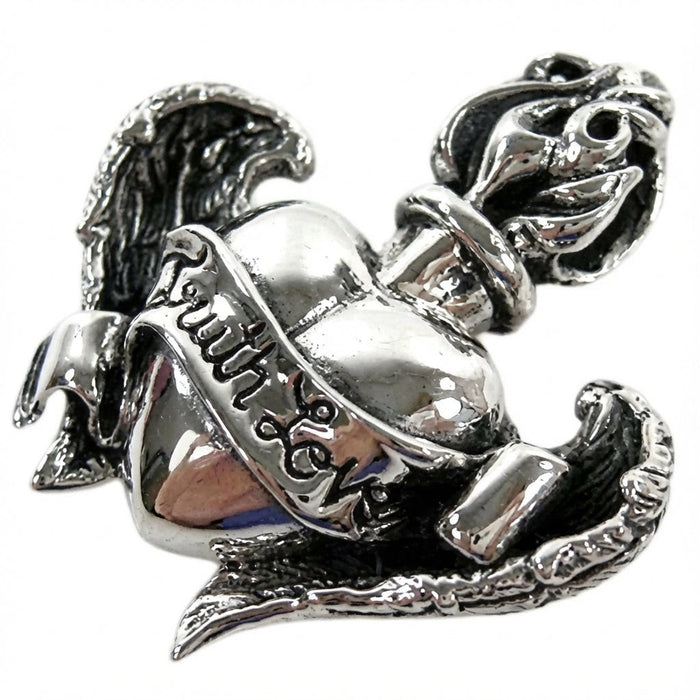 Angled view of handcrafted sterling silver heart pendant showing With Love Gothic script banner