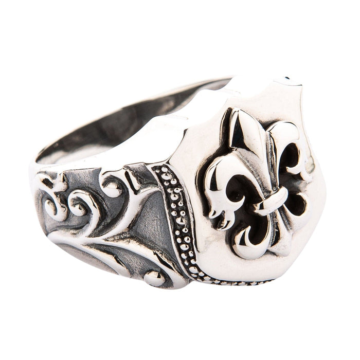 A premium 925 sterling silver Fleur-de-lis ring, meticulously handcrafted in a bold, masculine signet style.