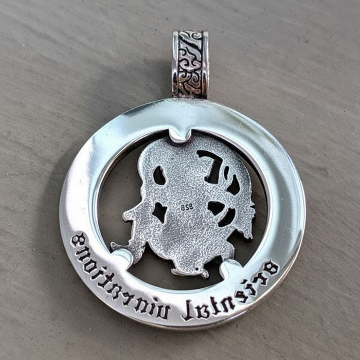 The back of the Japanese Fujin pendant, showing the "Oriental Vibrations" text and 925 stamp.