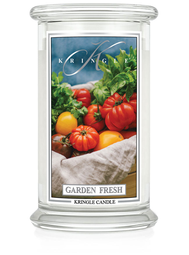 Clear jar candle labeled "Garden Fresh" with an image of assorted tomatoes and greens on the front.
