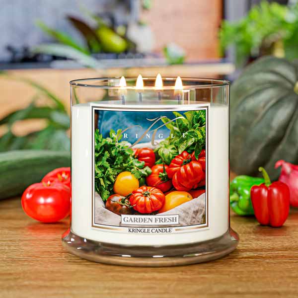 Kringle Candle jar labeled "Garden Fresh" with an image of tomatoes and greens on the front.