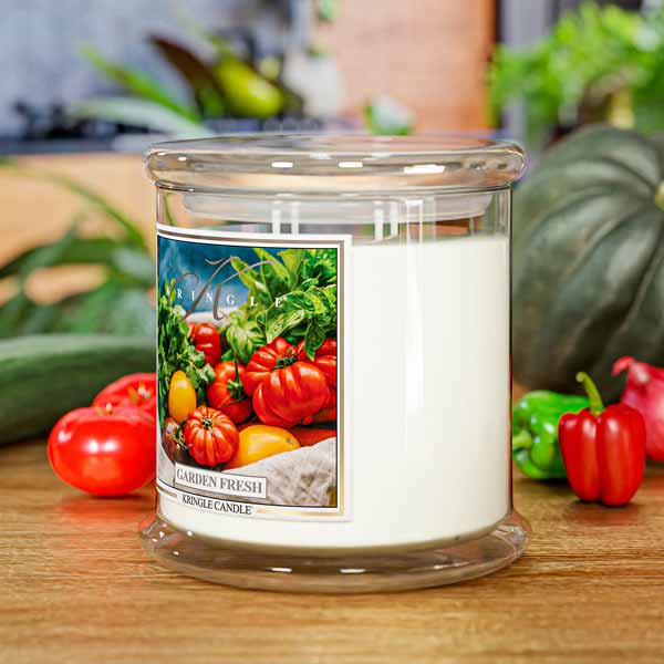 Kringle Candle jar labeled "Garden Fresh" with an image of tomatoes and greens on the front.
