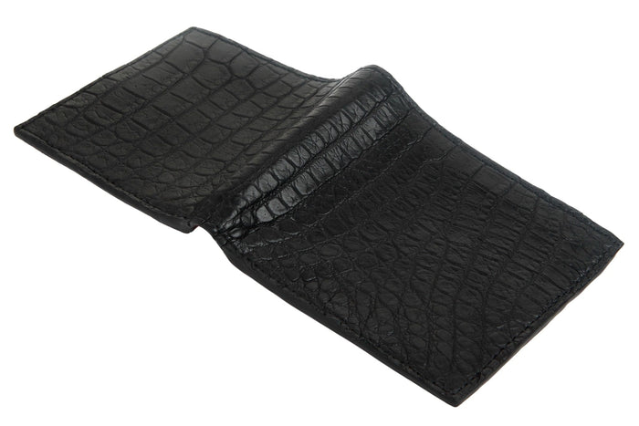 A fully opened view of the black crocodile wallet, showcasing the quality of the craftsmanship.
