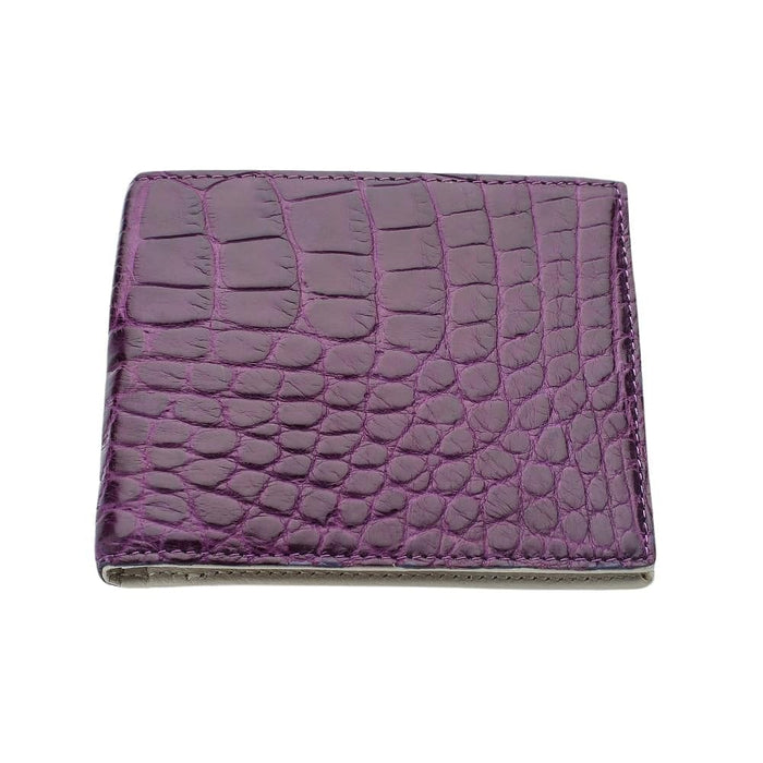 Angled view of the open wallet, revealing interior card slots and bill compartments in purple crocodile leather.