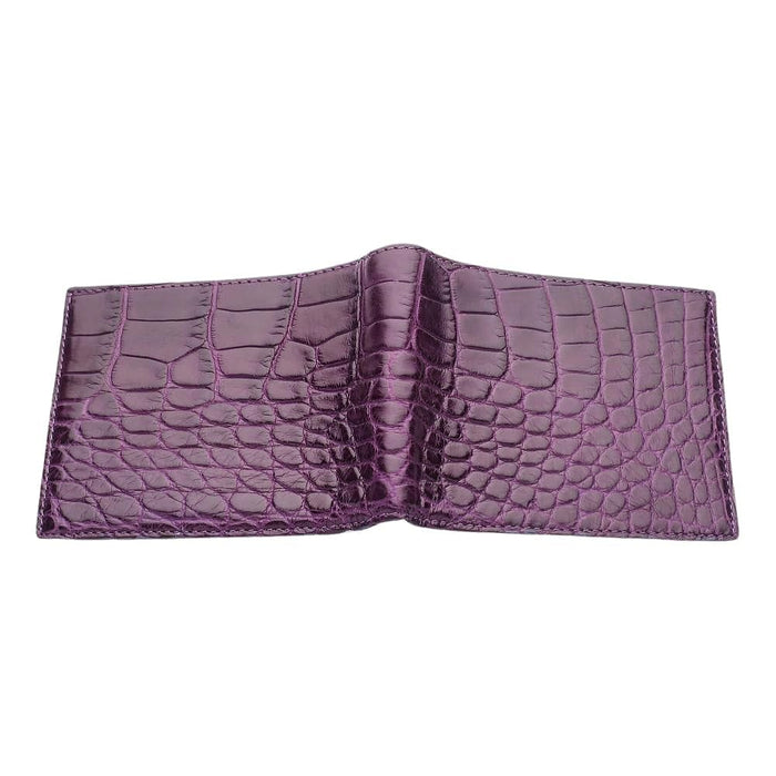 Side three-quarter of the closed wallet, with the layered leather thickness and stitched edges visible in purple.