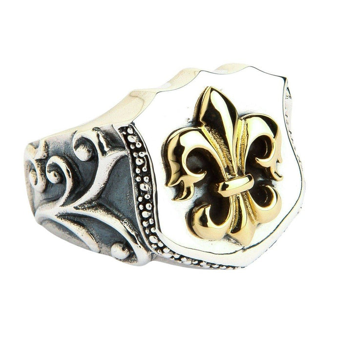 Gold fleur de lis sterling silver shield ring with ornate scrollwork band and gold-coated centerpiece on polished silver face