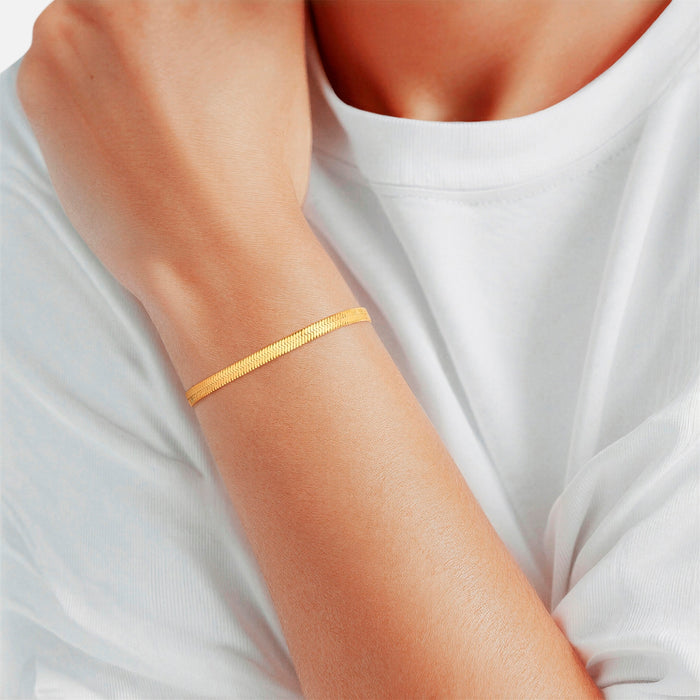 Goldenes Schlangenarmband