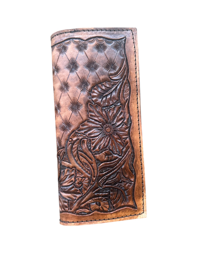 Hand tooled tally book.