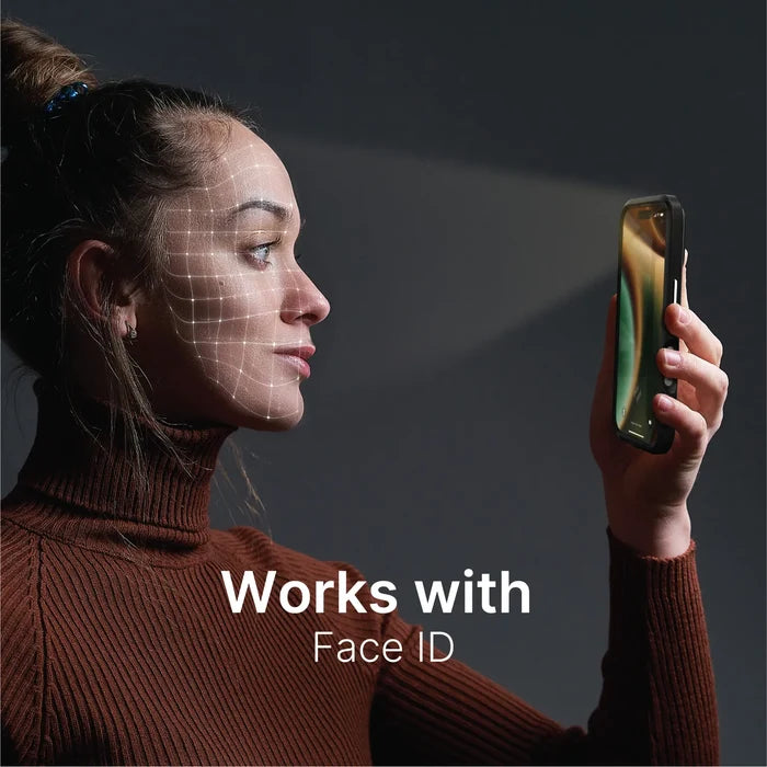 A woman in a brown turtleneck holds an iPhone 16 Pro Max with a Catalyst Case US Tempered Glass Screen Protector. White facial recognition lines appear as the phone emits light, with text: “Works with Face ID.”.