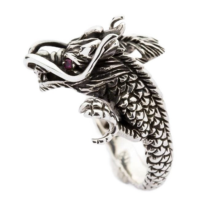 Profile view of mens dragon ring with red cubic zirconia eye