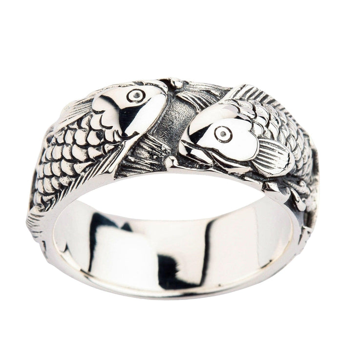 A sterling silver Japanese koi ring featuring two intricately engraved fish swimming in a continuous loop.
