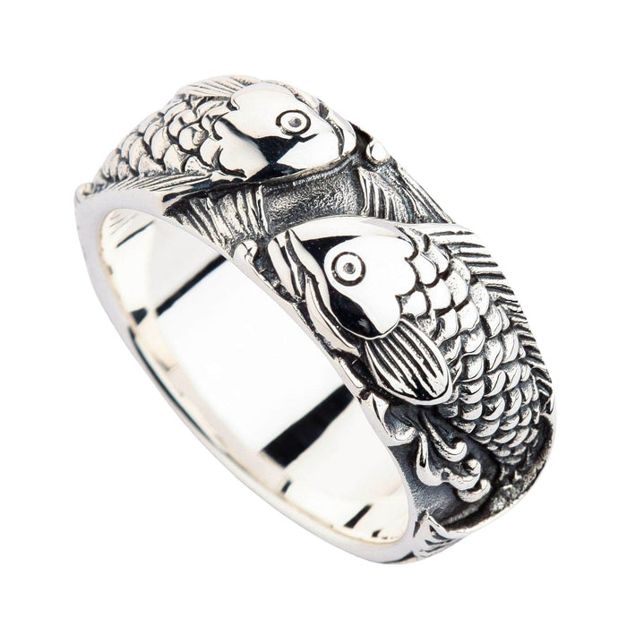 Side view of the sterling silver koi ring showcasing the seamless, wrap-around design of the fish.